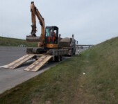 Einrichten der Baustelle und Anlieferung von Material